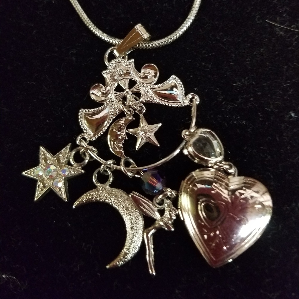 Silver Kirks Folly necklace with charms & holder